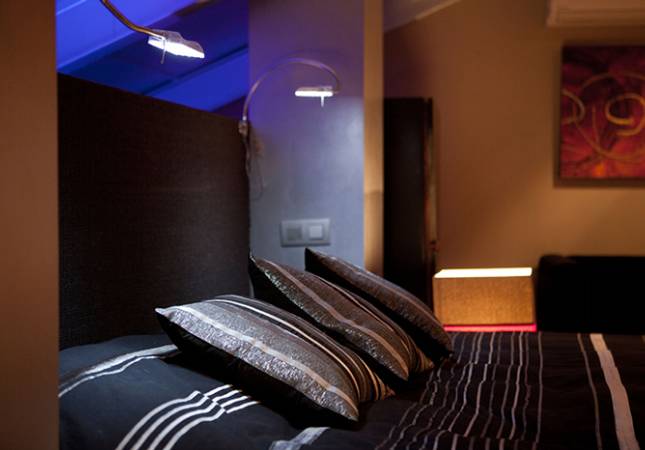 Espaciosas habitaciones en Hotel Cardamomo Sigüenza. Relájate con nuestro Spa y Masaje en Guadalajara